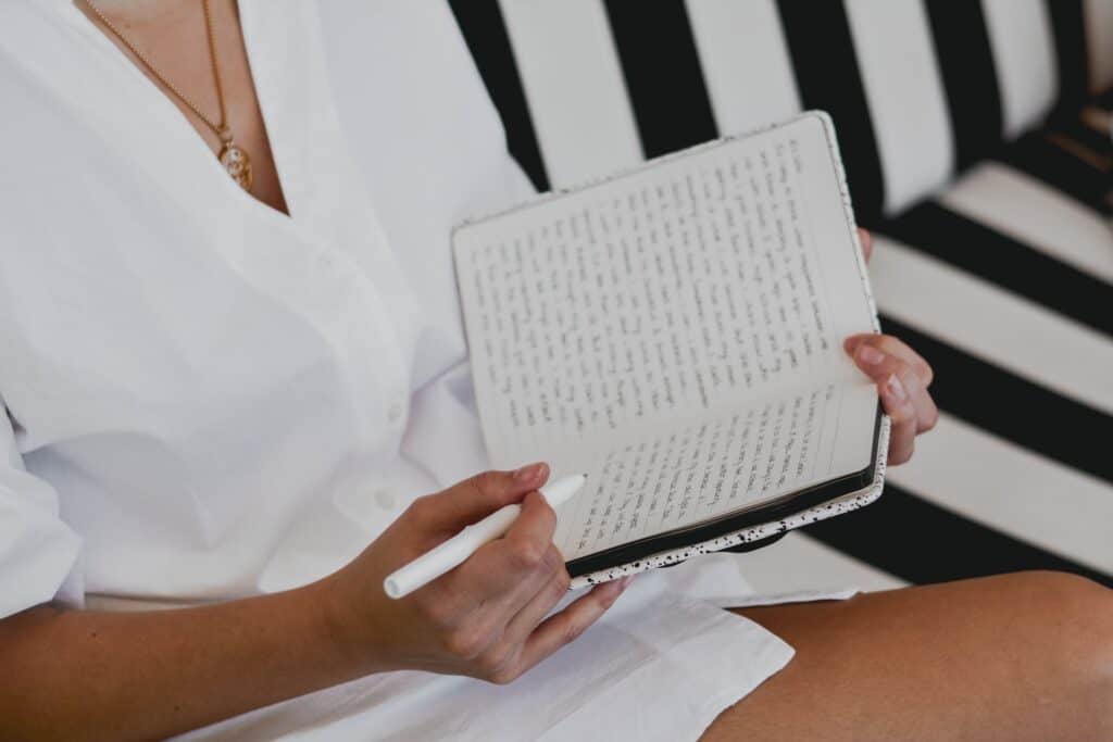 woman reading her journal entries