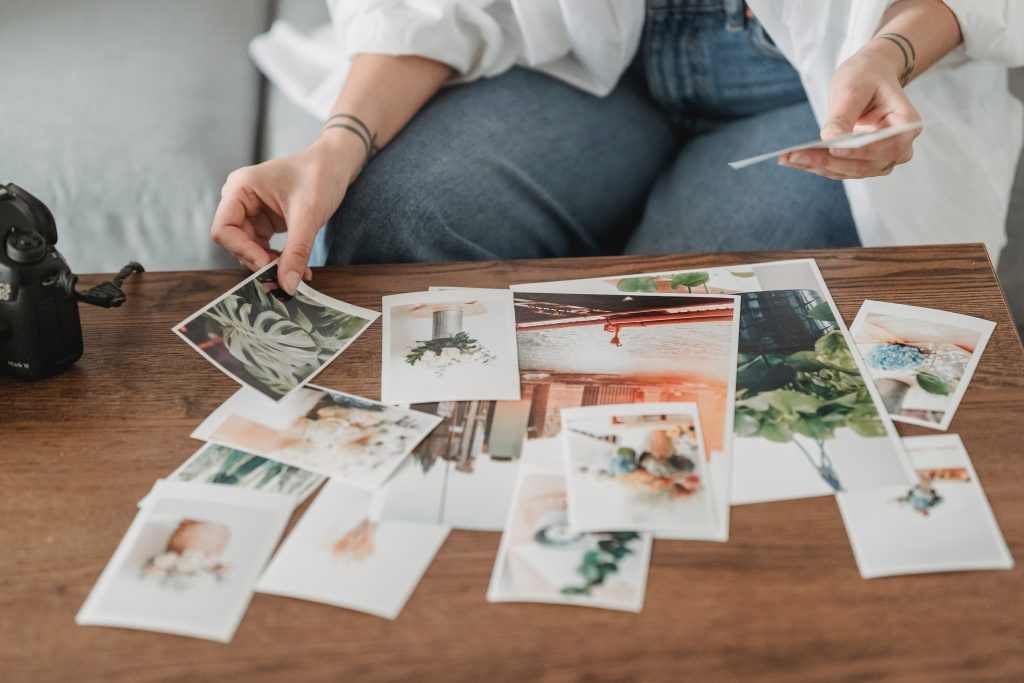 woman making a vision board collage