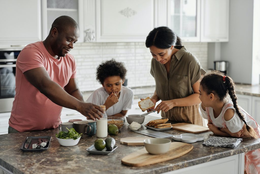 family preparing meal together