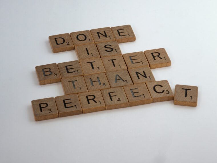 scrabble pieces reading "done is better than perfect"