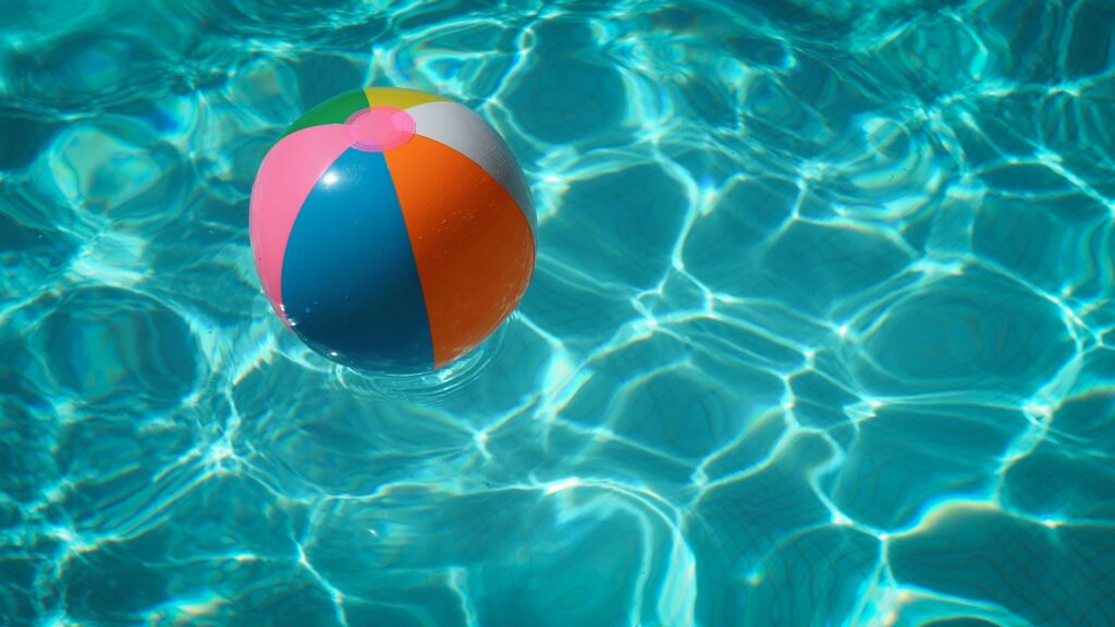 beach ball floating in a pool.
