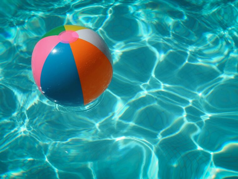 beach ball floating in a pool.