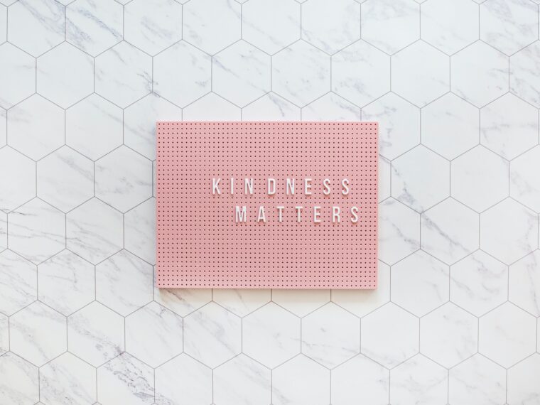 Plaque reading kindness matters message.